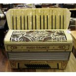 A Hugo Rauner Concerto accordion with original box, made in Germany