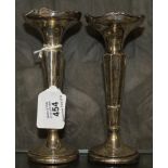 A pair of silver specimen vases