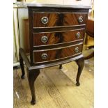 A Georgian-style mahogany bow fronted smaller chest of drawers or bedside locker with shaped top,