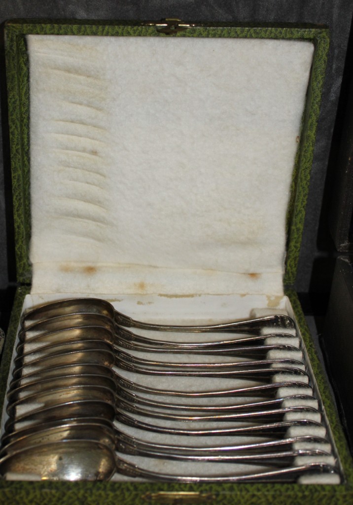 A cased set of twelve French dessert spoons