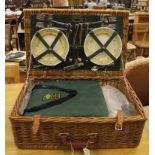 An Optima West Sussex vintage wicker picnic basket with full accessories