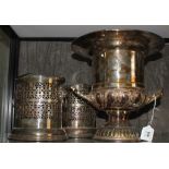 A silver plated ice bucket in the form of a Campana urn with twin handles with two early 20th