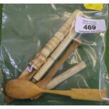 A selection of bone collectibles, to include a pen, pencil, apple corer, etc