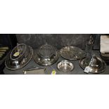 A broad assortment of silver plated tableware, to include two entree dishes, circular tray, muffin