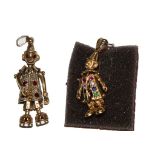 Two 9 carat gold gem set clown pendants