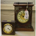 A late 19th century Continental-style mahogany framed mantle clock with brass handle and ormolu