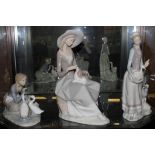 Three Lladro figurines of ladies, 18cm, 30cm and 32cm high