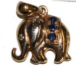 A single 14 carat gem-set elephant pendant