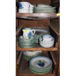 A Mary Hadley stoneware service comprising cups, saucers, plates, jug, etc