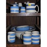An assortment of TG Green Cornish Blue kitchen ware, to include mugs, bowls, jug, sugar shaker, etc