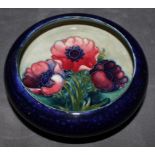 A Moorcroft anamone circular bowl, 13cm diameter