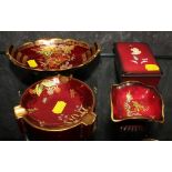 Four Carlton Ware' Rouge Royale' with various enamelled decoration, flowers, insects, etc