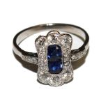 An Art Deco 18 carat white gold sapphire and diamond ring