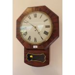 A Victorian mahogany framed octagonal wall clock with circular dial, fusee movement, Roman numerals