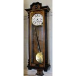 A 19th century-style mahogany and lacquered Viennese wall clock with shaped cornice, fluted