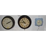 Three retro wall clocks with Arabic numerals, each fitted for electricity
