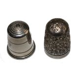 Two silver thimbles