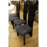 A set of four contemporary Pietro Constantini Italian dining chairs with spindle supports and fabric