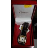 A Santos De Cartier 907901-27953 quality replica wristwatch with black leather strap with box in