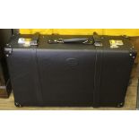 A black Jaguar XK8 suitcase