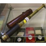 An extending telescope in leather case