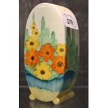 A Clarice Cliff Bonjour shaped sugar sifter in the Fragrance pattern, with original red stopper,