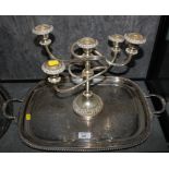 A silver-plate two-handled try and a five branch candleabra