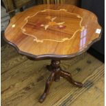 A 19th century-style mahogany circular occasional table with wavy-rim top and floral marquetry,