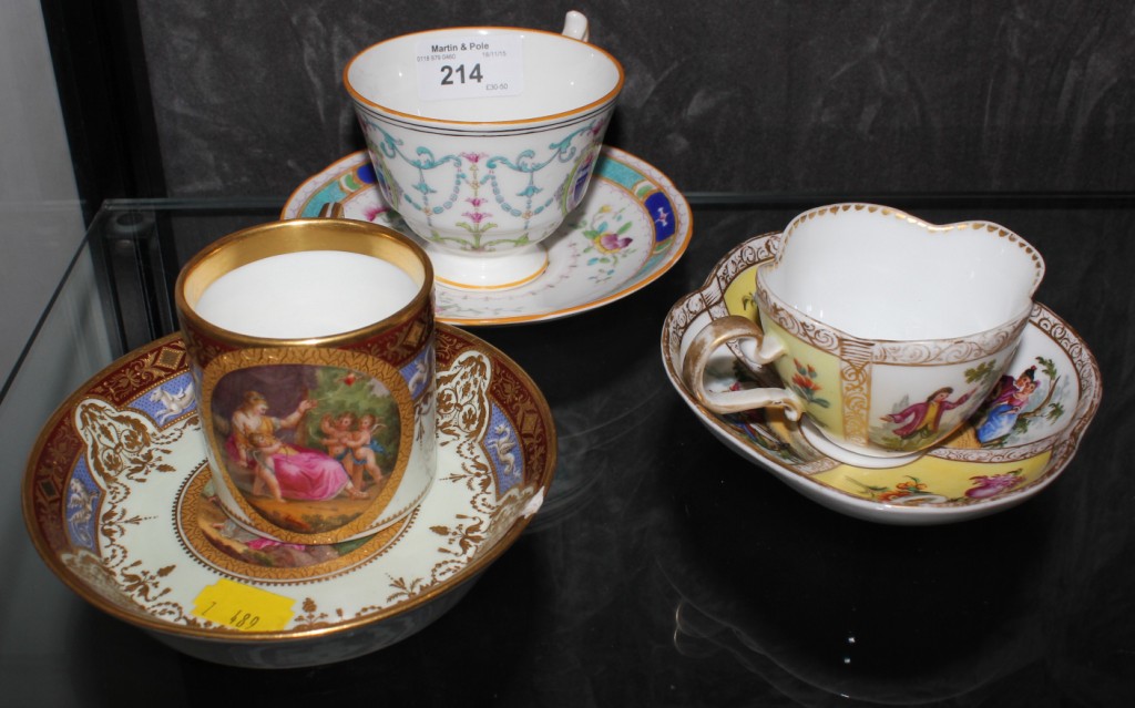 A Dresden cup and saucer, Viennese cabinet cup and saucer and one Doulton