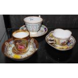 A Dresden cup and saucer, Viennese cabinet cup and saucer and one Doulton