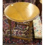 An oak circular table with barley twist legs, 72cm x 60cm diameter