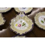 An English 19th century porcelain set of three dishes and six plates