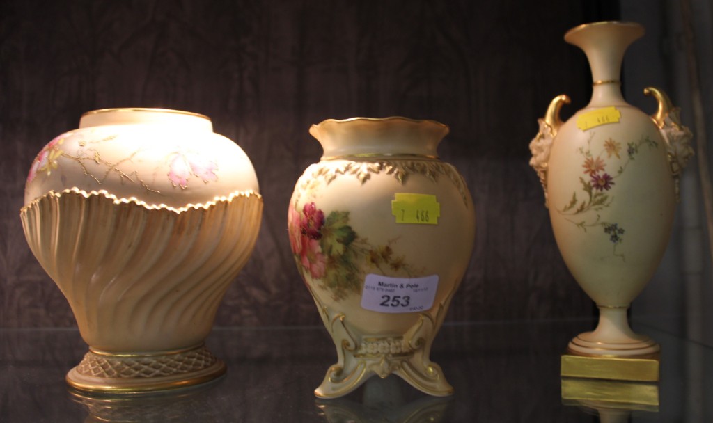 Three Royal Worcester ivory ground vases