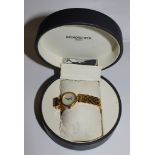 A Raymond Weil gold plated lady's quartz wristwatch