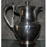 A two pint silver plated coffee jug by Mappin and Webb, a large round silver plated tray with