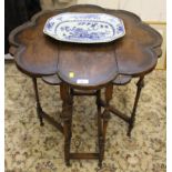 A small Sutherland table with shaped top, 68cm high x 60cm diameter