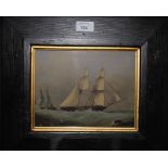 A pair of marine prints in black frame