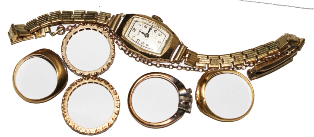 Five gem set rings and a ladies 1930's gold wristwatch