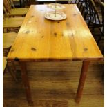 A pine kitchen table, 73H x 122W x 68cmD