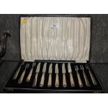 A cased six piece tea knives and forks, Elkington