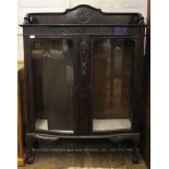A 19th century mahogany display cabinet with glazed doors and shelved interior