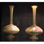 A pair of Royal Worcester pear-shaped ivory ground vases, puce 1748 marks