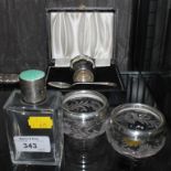 Pair of silver rim salts and silver topped bottles, silver egg cup and spoon