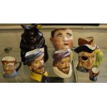 Eight Toby jugs, including three by Royal Doulton