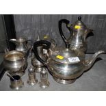 A selection of silver plate to include a four piece tea set, sugar shakers, etc