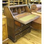 A bureau with four drawers, open shelf and green leather inset slope, 93H x 75W x 42cmD