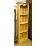 A modern pine three-shelf bookcase, 120H x 30W x 25cmD