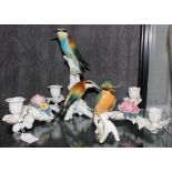 A Karl Ens German porcelain figure of a kingfisher, a simular group of two birds on a branch (bill