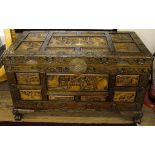 A carved Chinese camphor wood chest