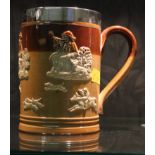 A Doulton Lambeth and silver mounted tankard inscribed around rim